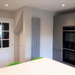 Howdens Clerkenwell Gloss kitchen in slate grey with white quartz worktops