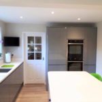 Howdens Clerkenwell Gloss kitchen in slate grey with white quartz worktops